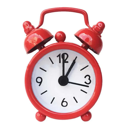 Piccola sveglia analogica bianca da comodino